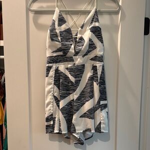 AKIRA Navy and White Jumpsuit with Sleek Design